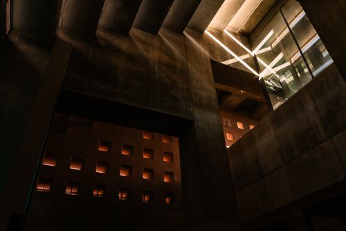Free Dark modern concrete architecture with illuminated patterns and geometric shapes in Tempe, AZ. Stock Photo