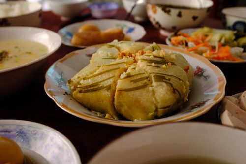 Free Close-up of traditional Vietnamese Banh Chung served during Tet celebrations in Bến Tre, Vietnam. Stock Photo