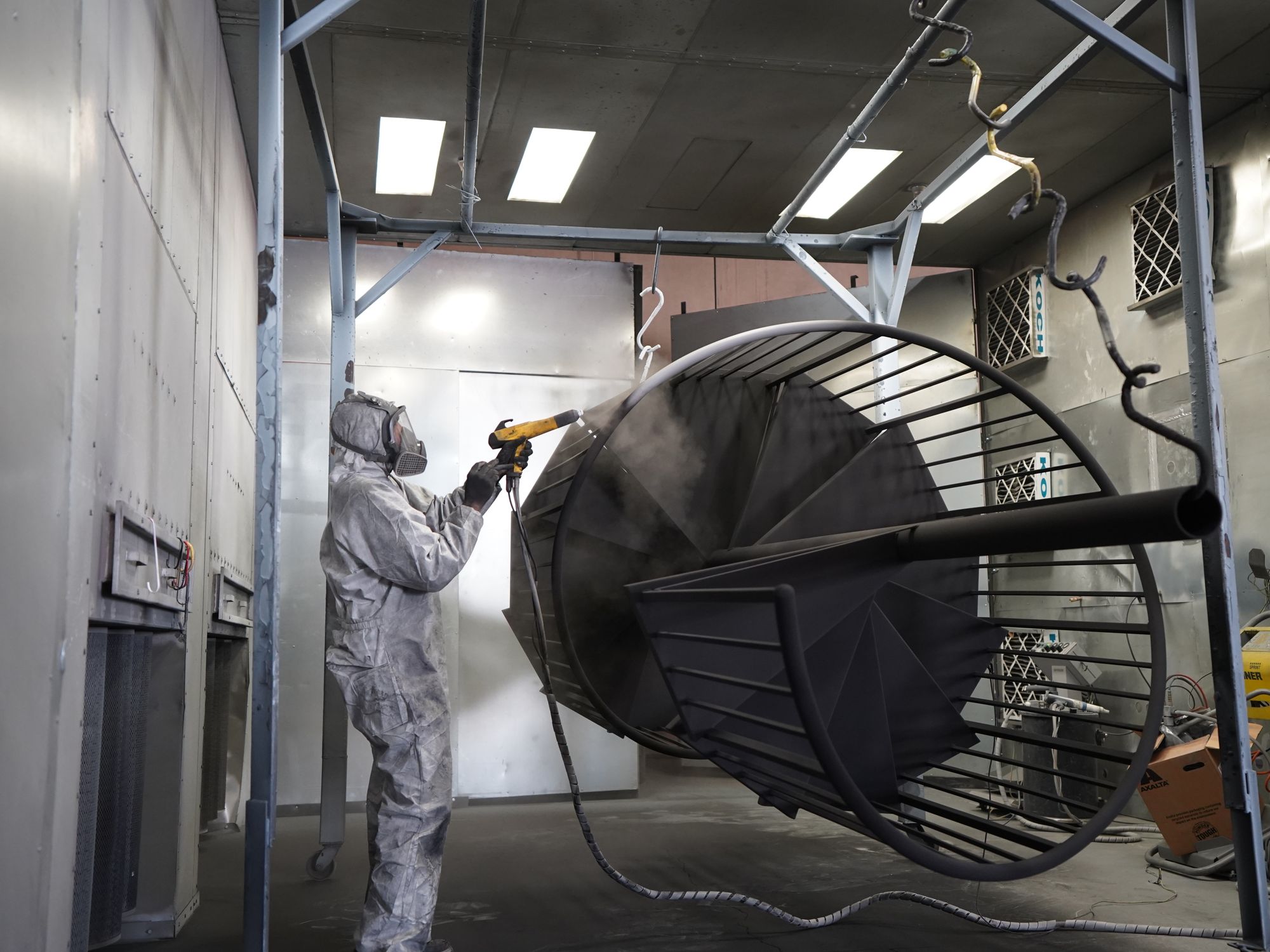 Interior Painting in Kenton, Brent — decorator applying interior paint to walls and ceilings