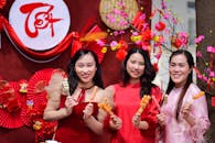Festive Asian Women Celebrating Lunar New Year