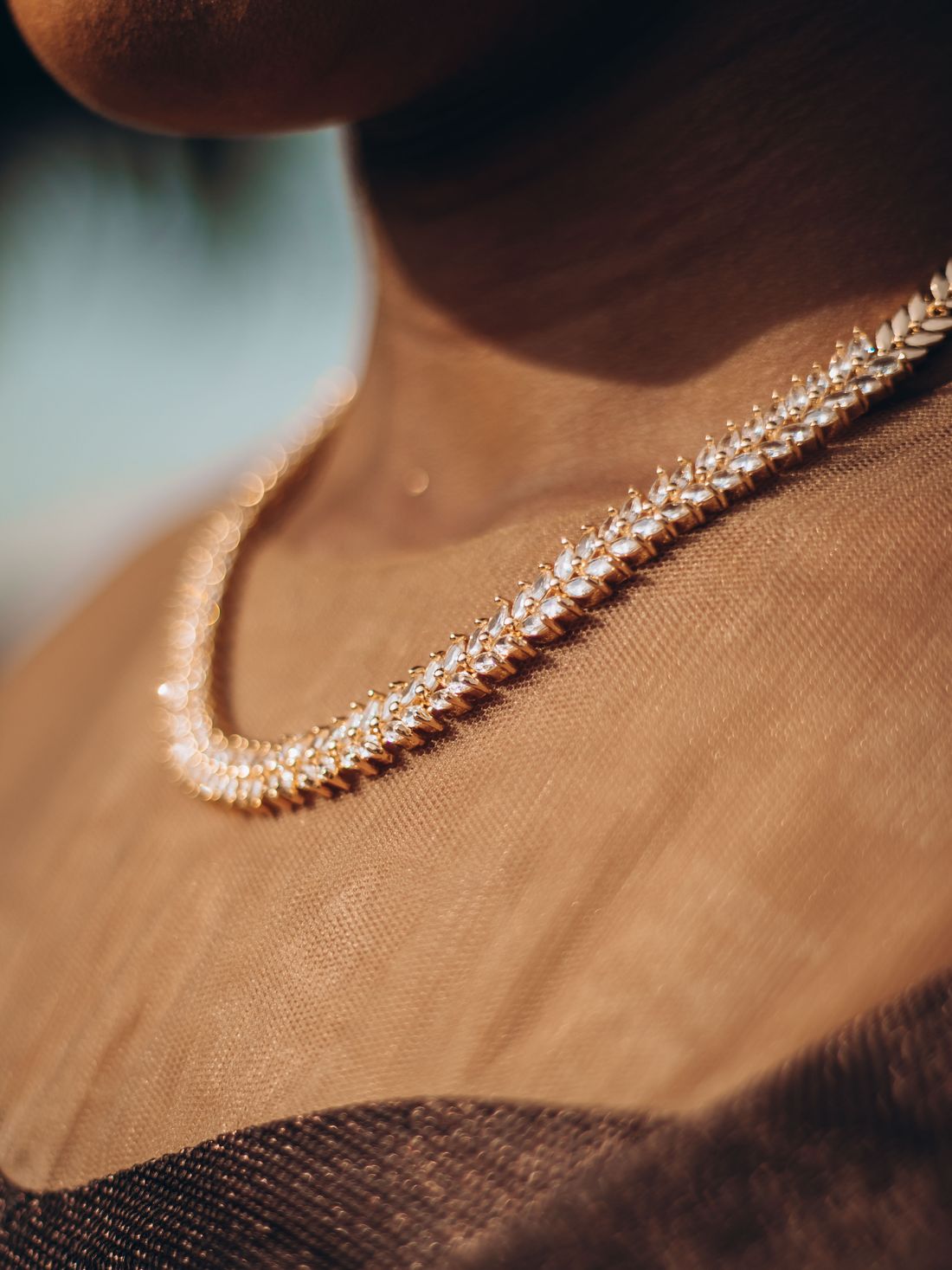 Bridal necklace worn at the collarbone
