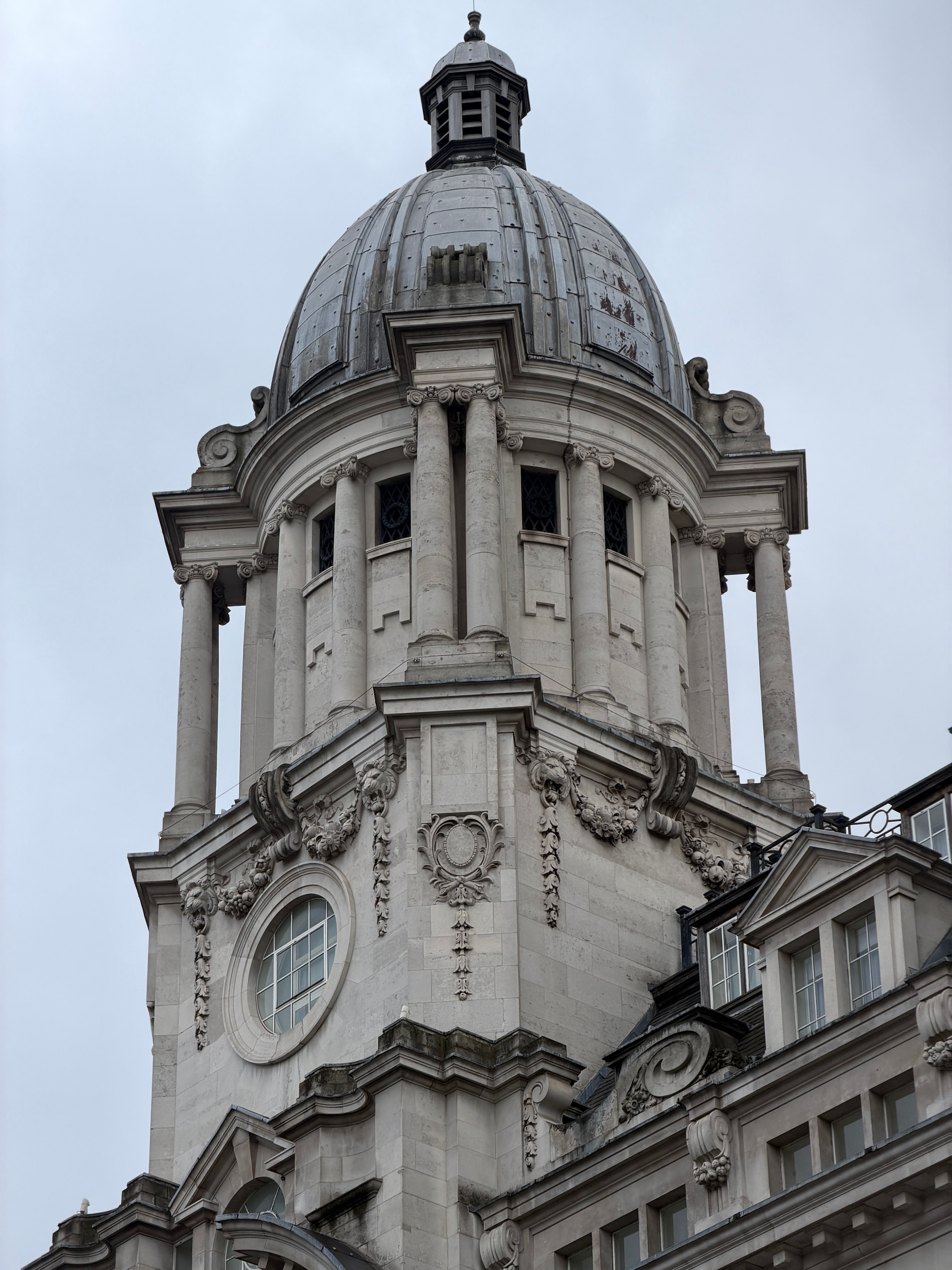 Close-up of a classic dome structure in London with intricate details, captured in daylight.