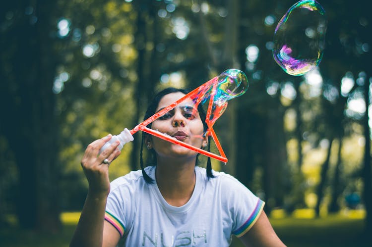 Woman Blowing Bubbles