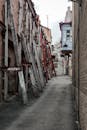 Urban Alleyway with Support Structures and Graffiti