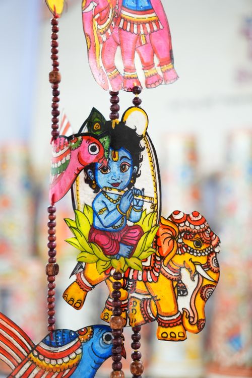 Free Colorful traditional hanging decor featuring Lord Krishna and elephants, captured in Bhubaneswar, India. Stock Photo