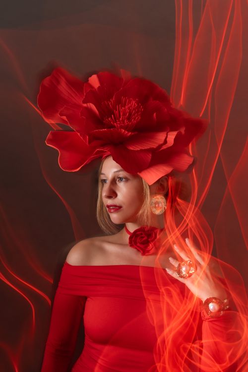Elegant Woman in Red Dress with Artistic Lighting · Free Stock Photo