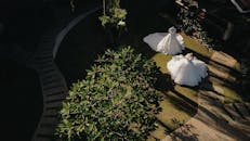 Aerial View of Mannequins Displaying Wedding Dresses Outdoors