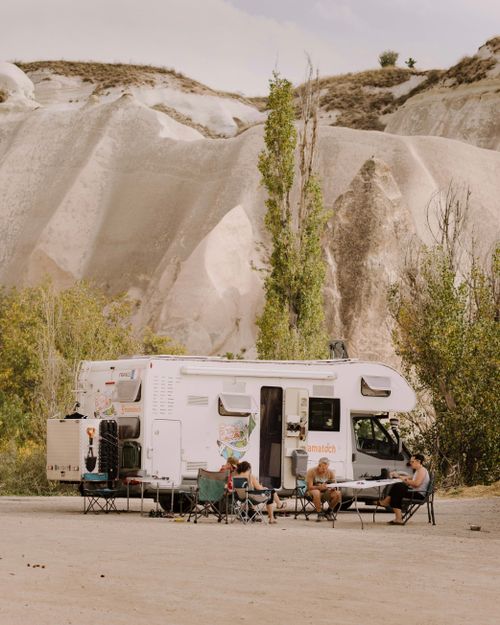 Free Family enjoys RV camping in the unique landscapes of Cappadocia, Türkiye. Stock Photo