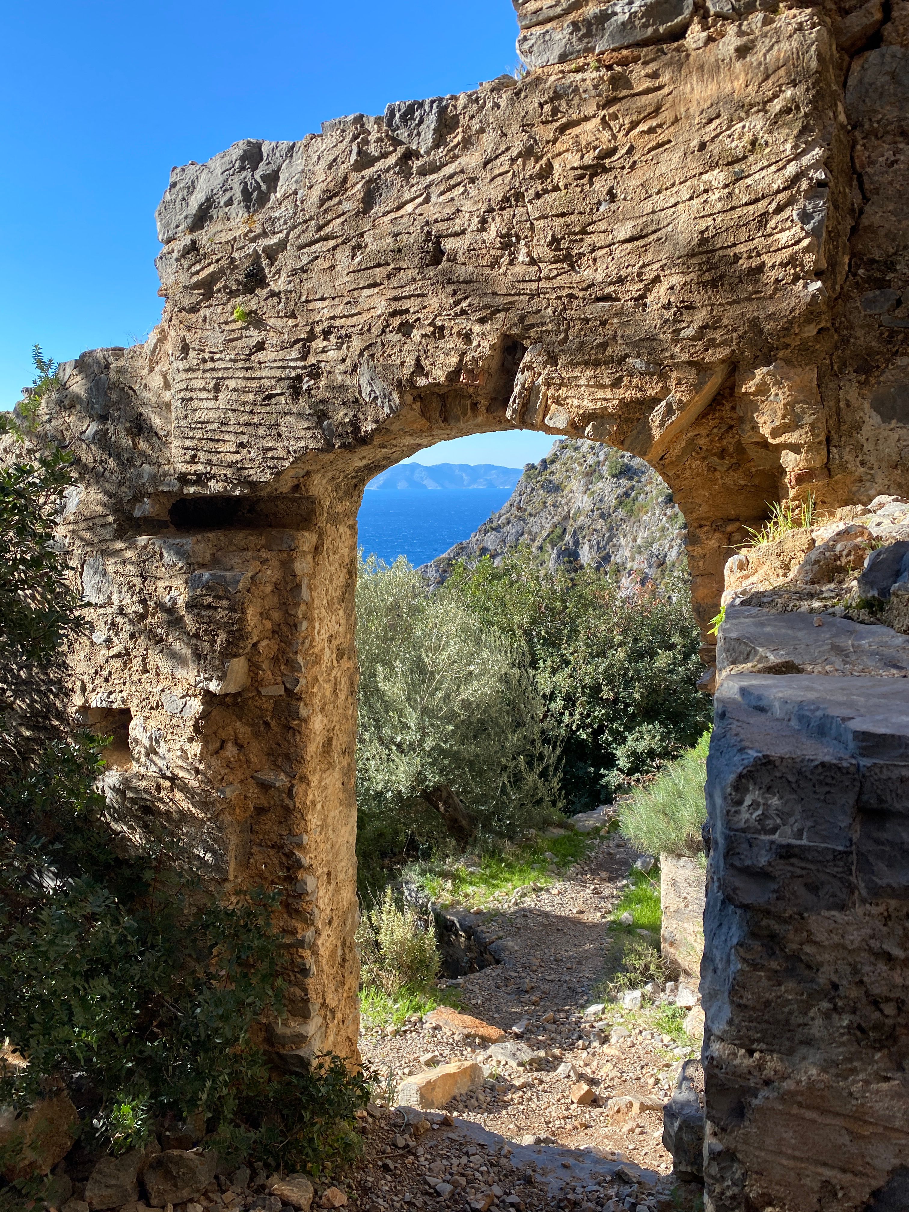 Ancient Stone Archway Overlooking Scenic Landscape · Free Stock Photo
