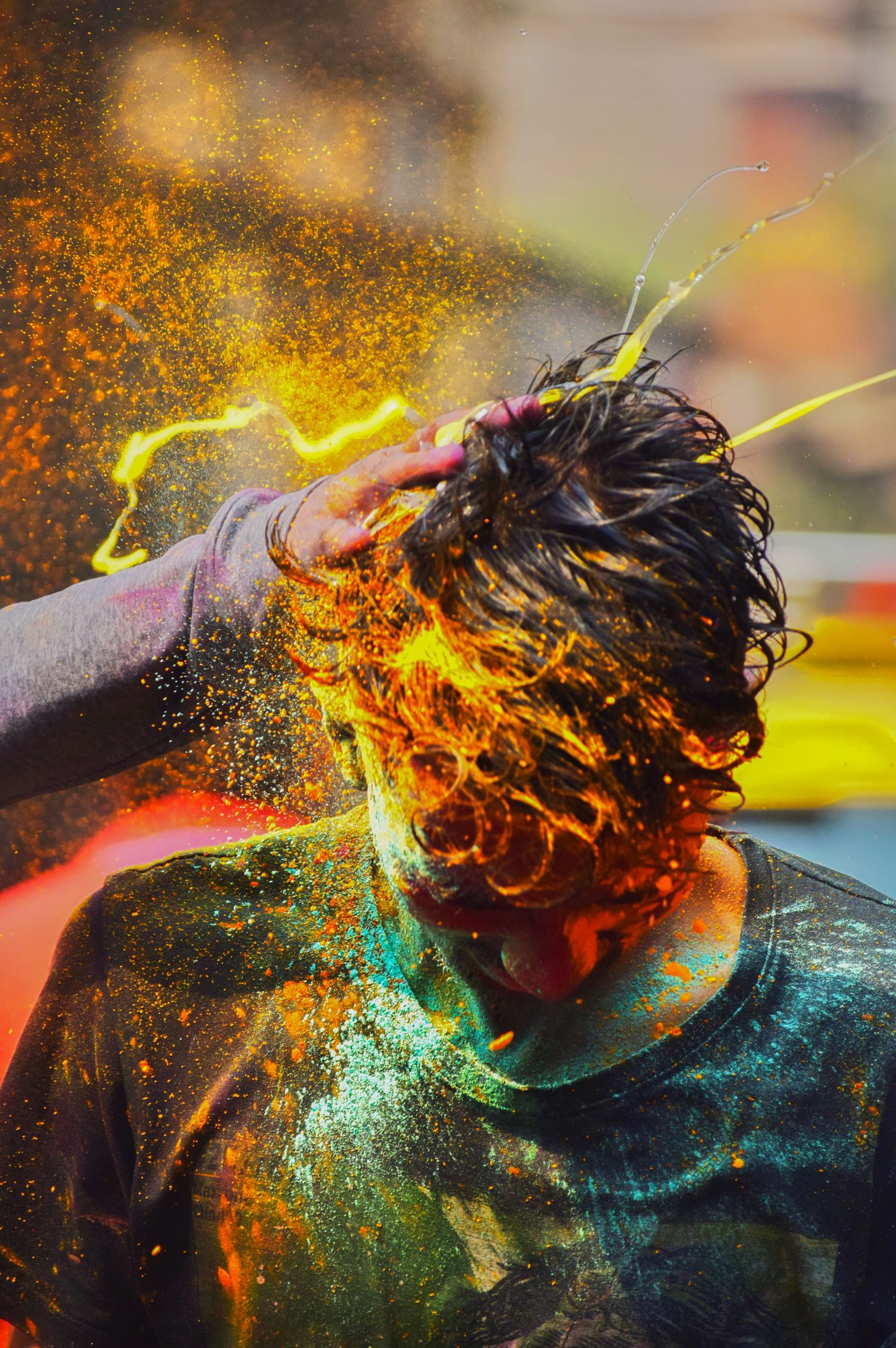 Man with Colorful Powder on His Head · Free Stock Photo