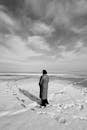Solitary Figure on Snowy Landscape in Kazakhstan
