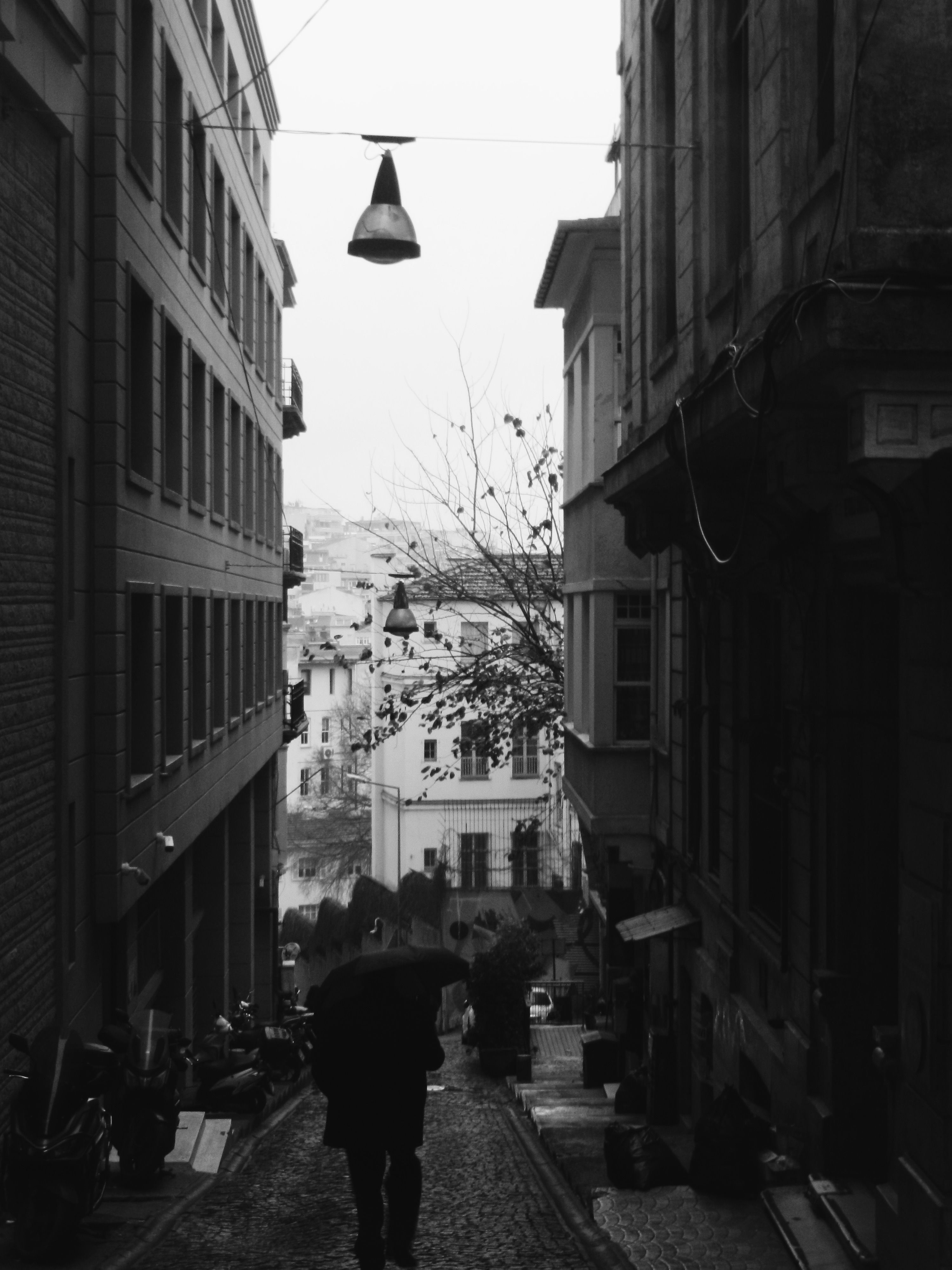 Black and White Urban Street Scene with Umbrella · Free Stock Photo