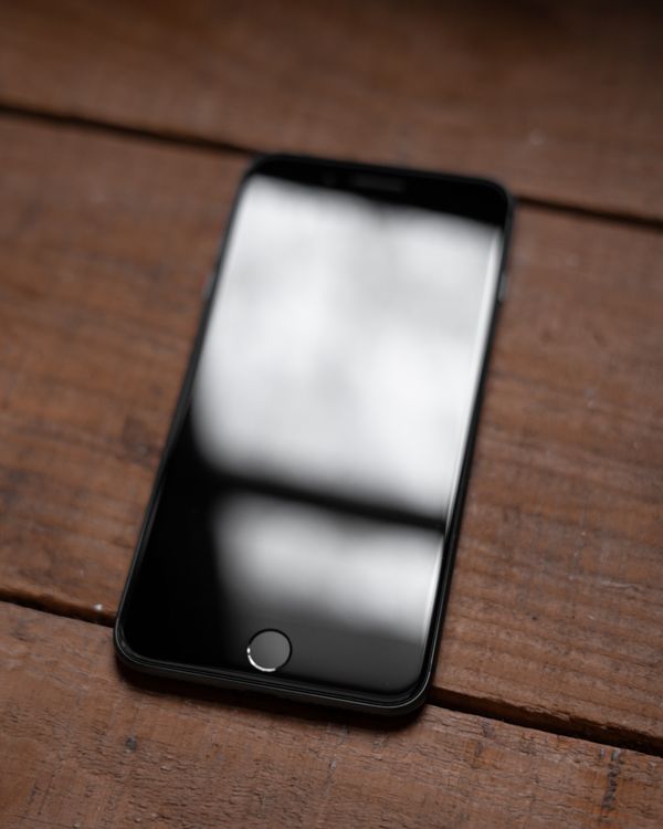 Iphone On Table Free Stock Photo iphone-on-table-free-stock-photo