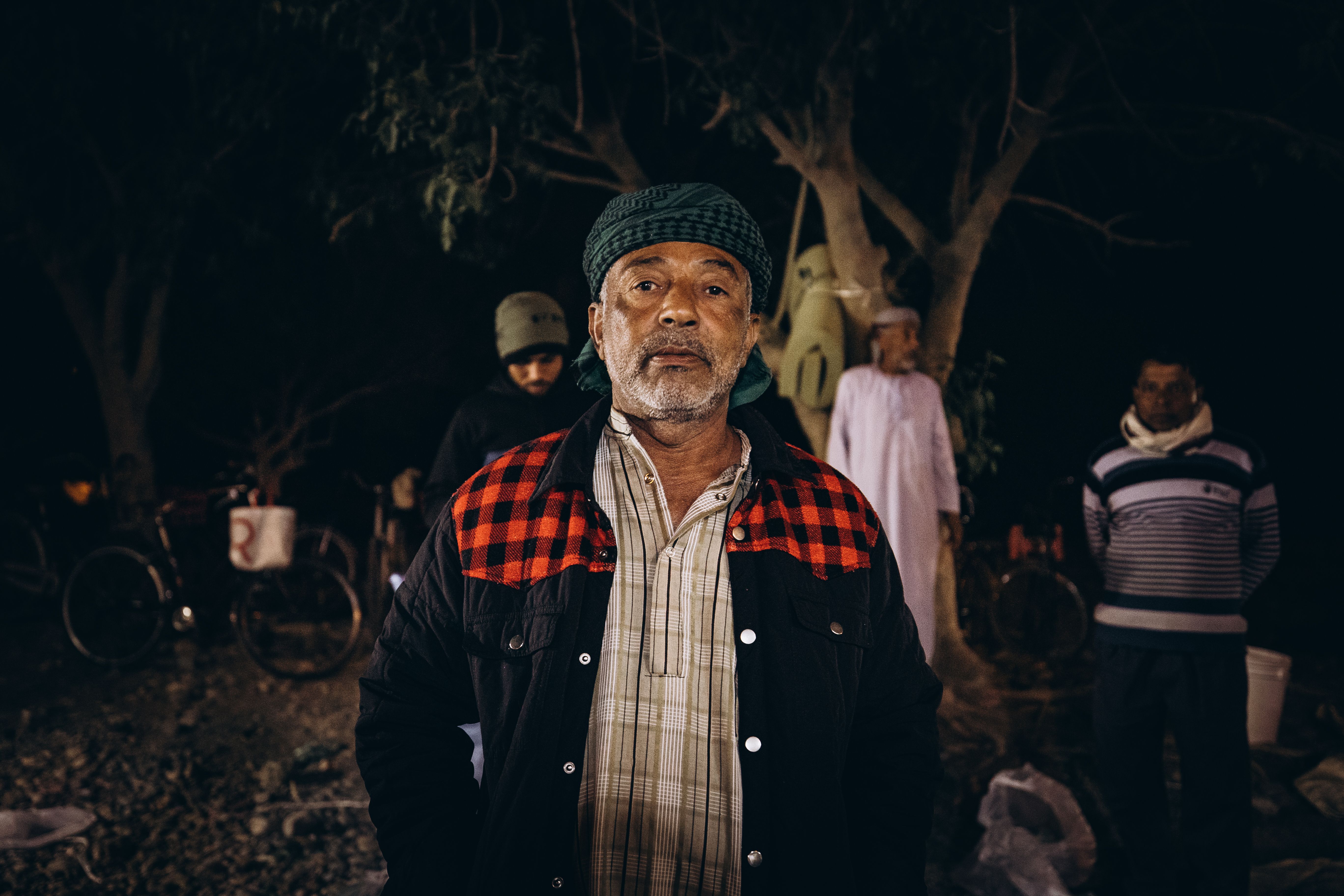 Portrait of Local Man at Night Market in Oman · Free Stock Photo