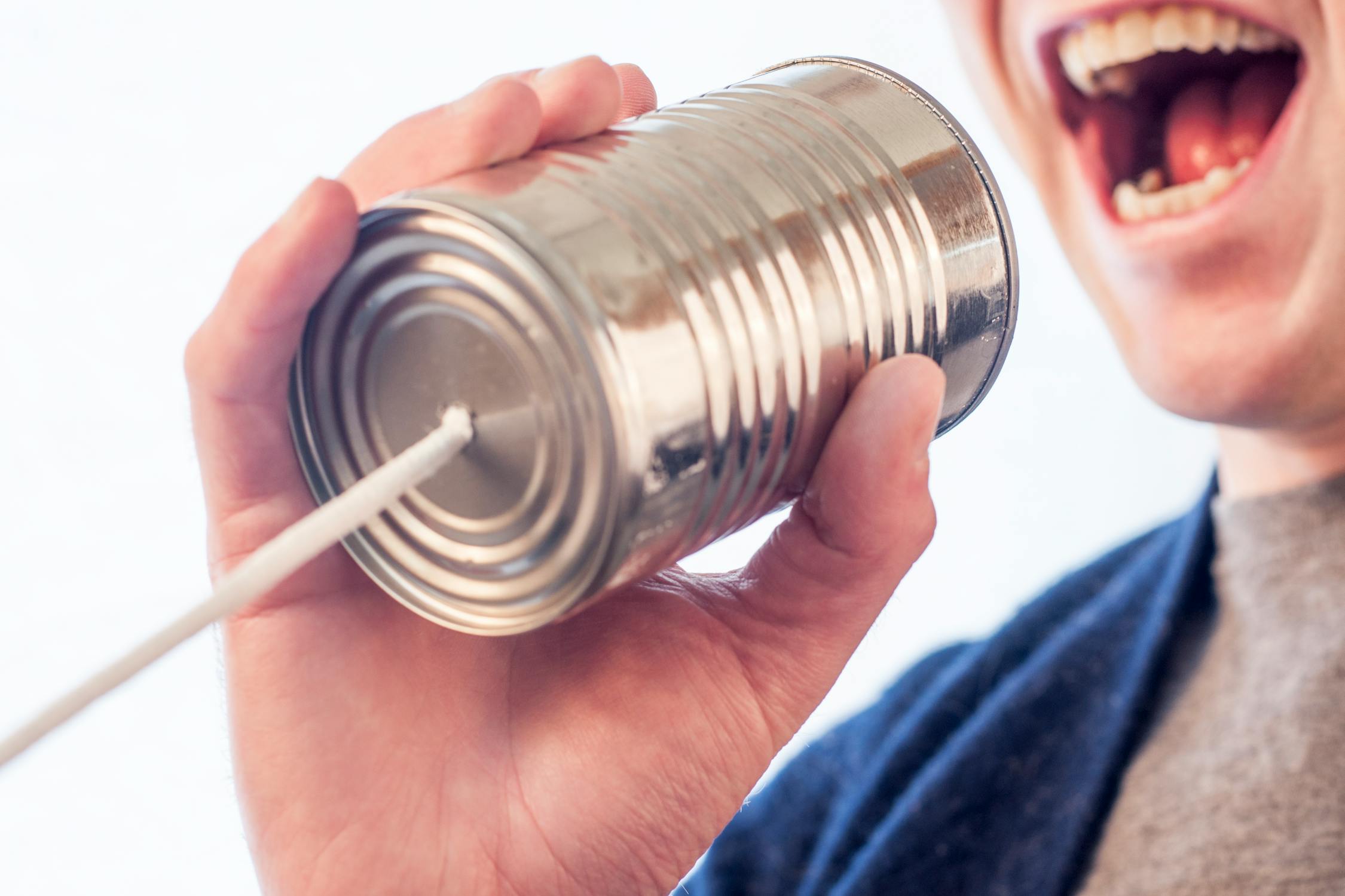 A tin can telephone - do not use it for communication during moving your office to Fort Lauderdale.