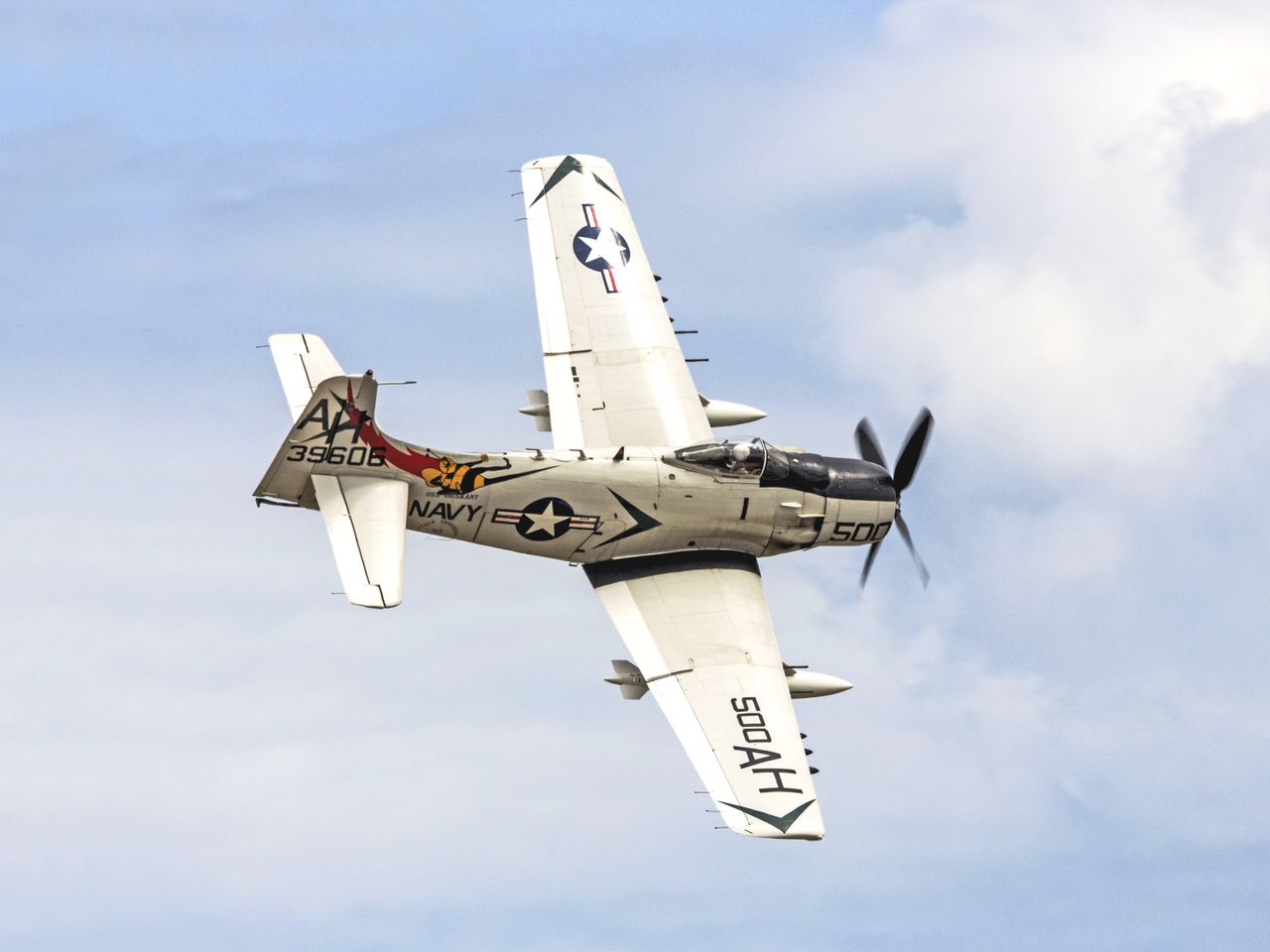 us navy a 1 skyraider aircraft soaring above titusville captured in dy
