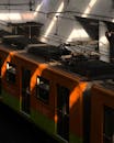 Orange Train in Sunlit Ciudad de México Station