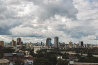 A stunning view of Nairobi's skyline under a dramatic sky.