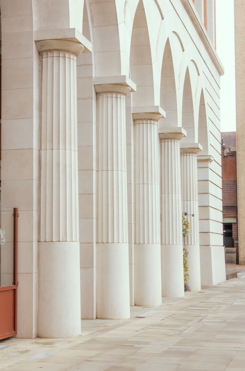 Free Pristine pillars and arches create a uniform architectural design in Birmingham, England. Stock Photo