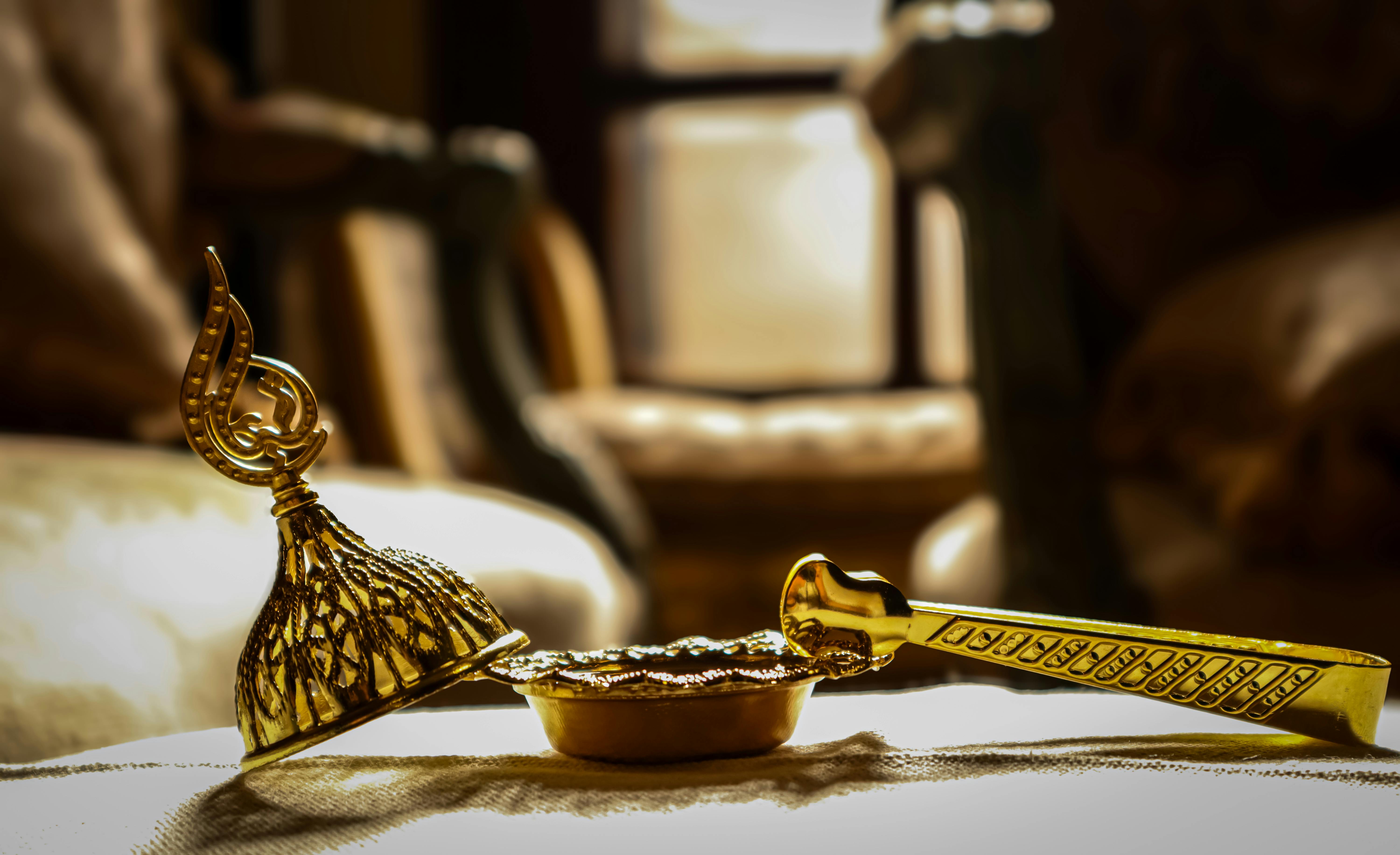 Free Close-up of a decorative brass incense burner, symbolizing cultural heritage and craftsmanship. Stock Photo