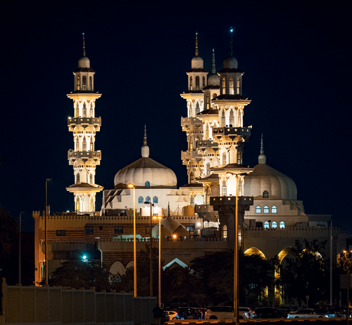 Free Illuminated mosque in Kuwait City showcasing stunning Islamic architecture at night. Stock Photo