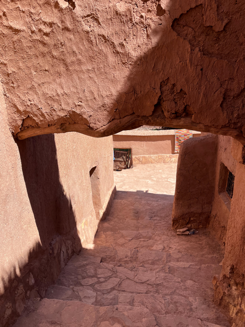 Free Explore the warm, rustic charm of a Moroccan passageway in Ouarzazate, Drâa-Tafilalet. Stock Photo