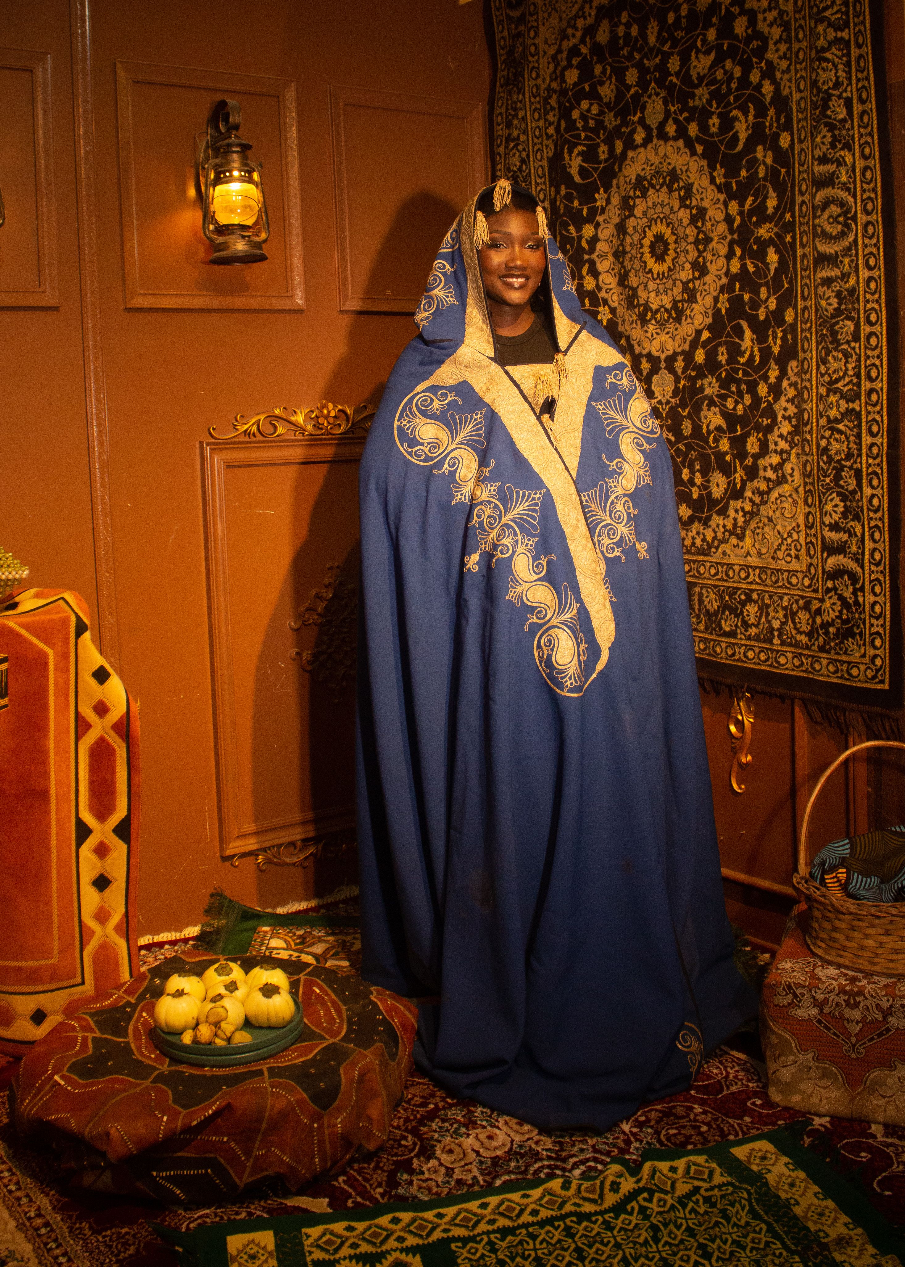 Woman in Traditional Blue Robe in Ornate Room · Free Stock Photo