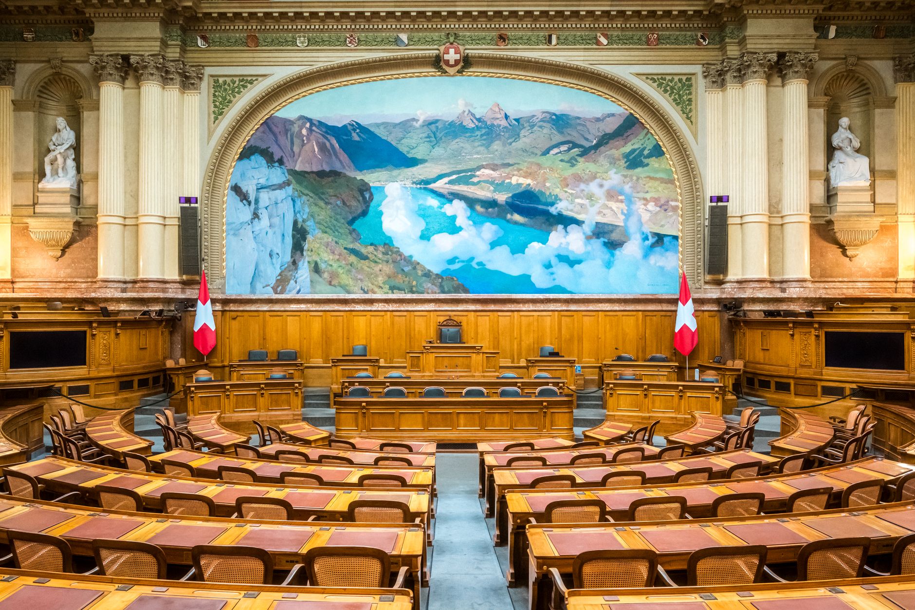 Interior view of the Swiss Parliament Building in Bern, showcasing its grandeur and Swiss heritage.