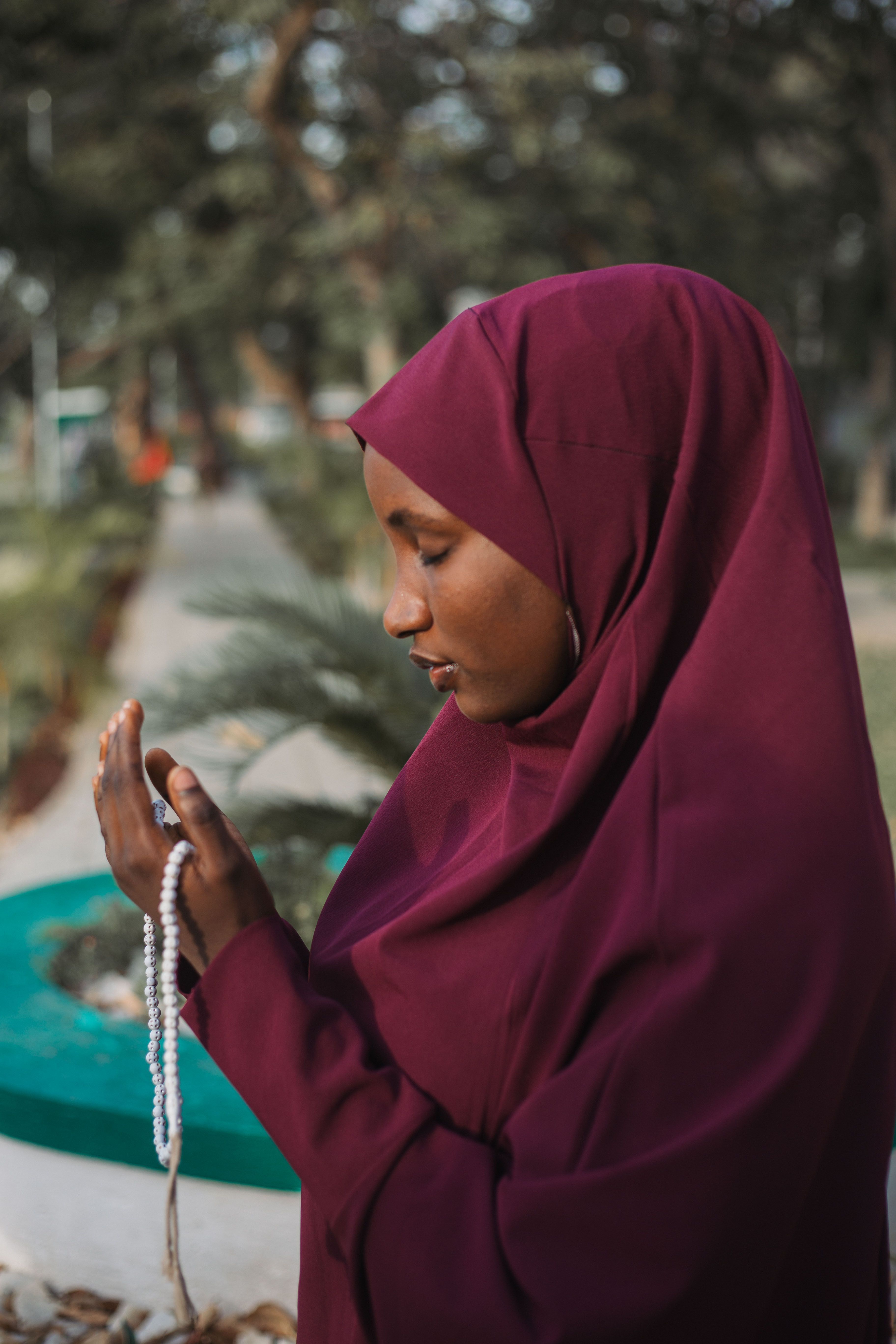 Woman Praying Outdoors in Bauchi Nigeria · Free Stock Photo