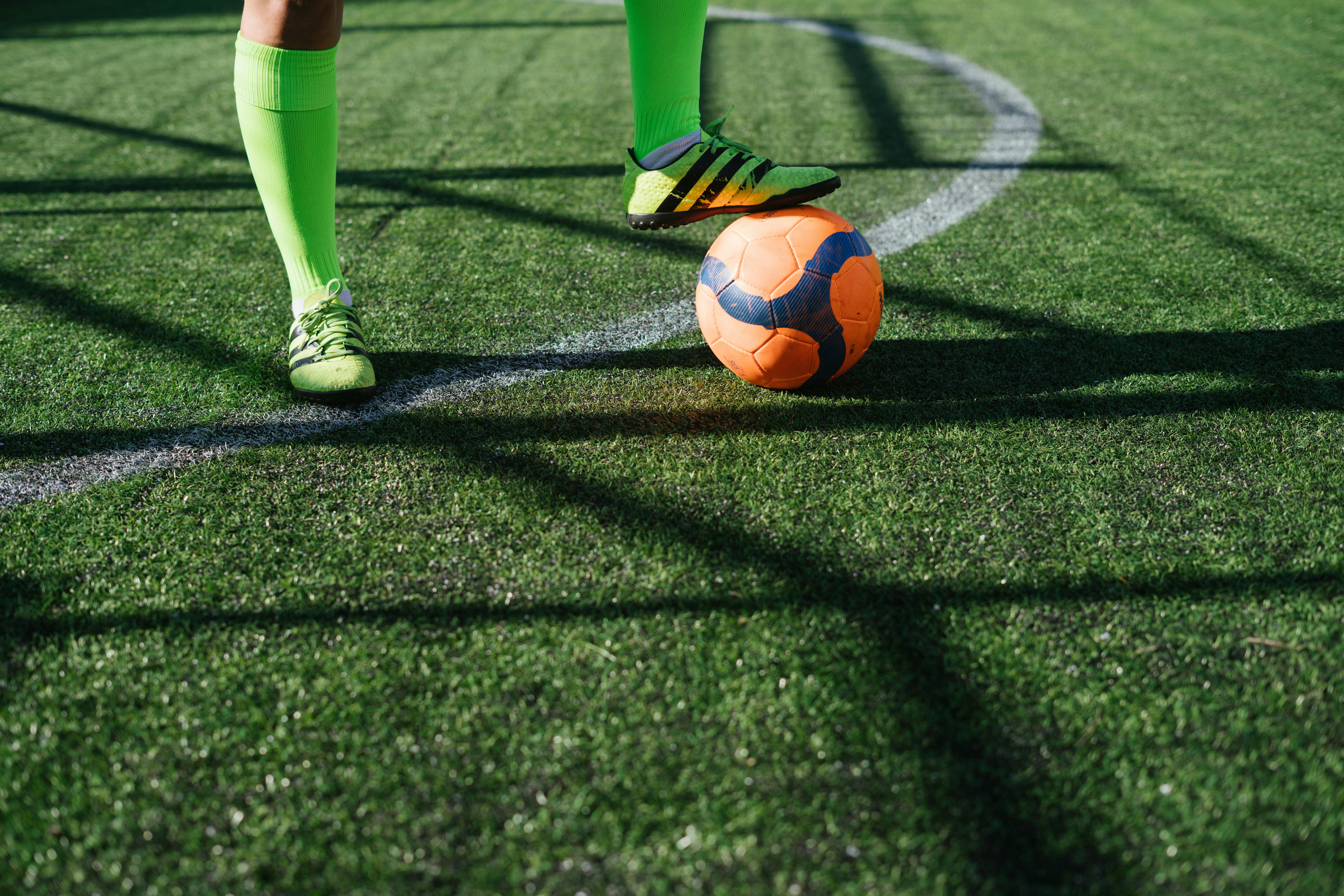 Photo Of Person Wearing Neon Green Socks \u00b7 Free Stock Photo