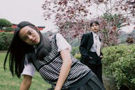 Two Young Women in Japanese Garden Setting
