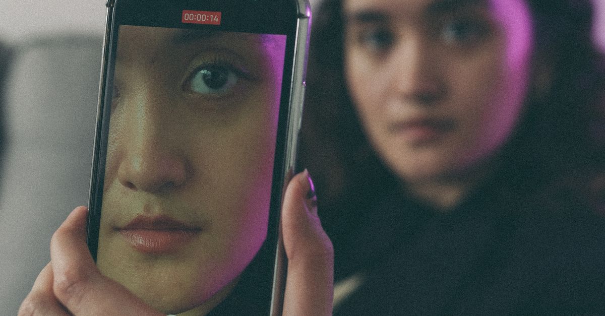 Is Cell Phone Reflection Creative Portrait with Smartphone Reflection · Free Stock Photo