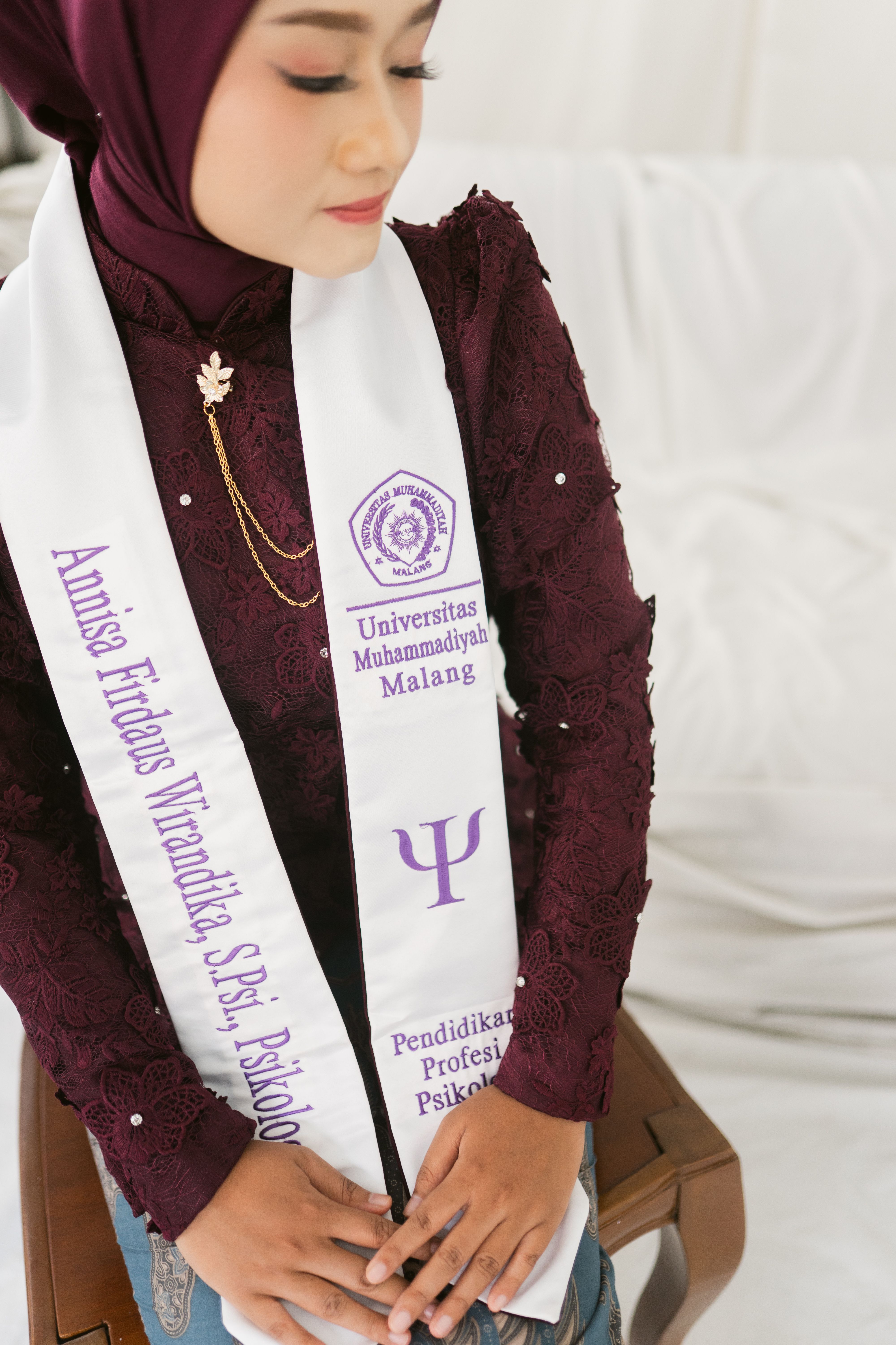 Female Graduate with Hijab in Ceremony Attire