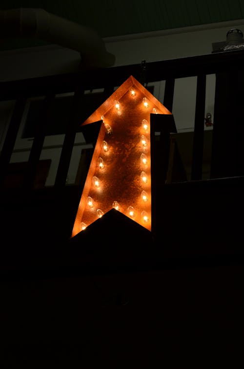 Free Lighted Brown Arrow Lamp Stock Photo