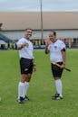 Soccer Referees Giving Thumbs Up on Field