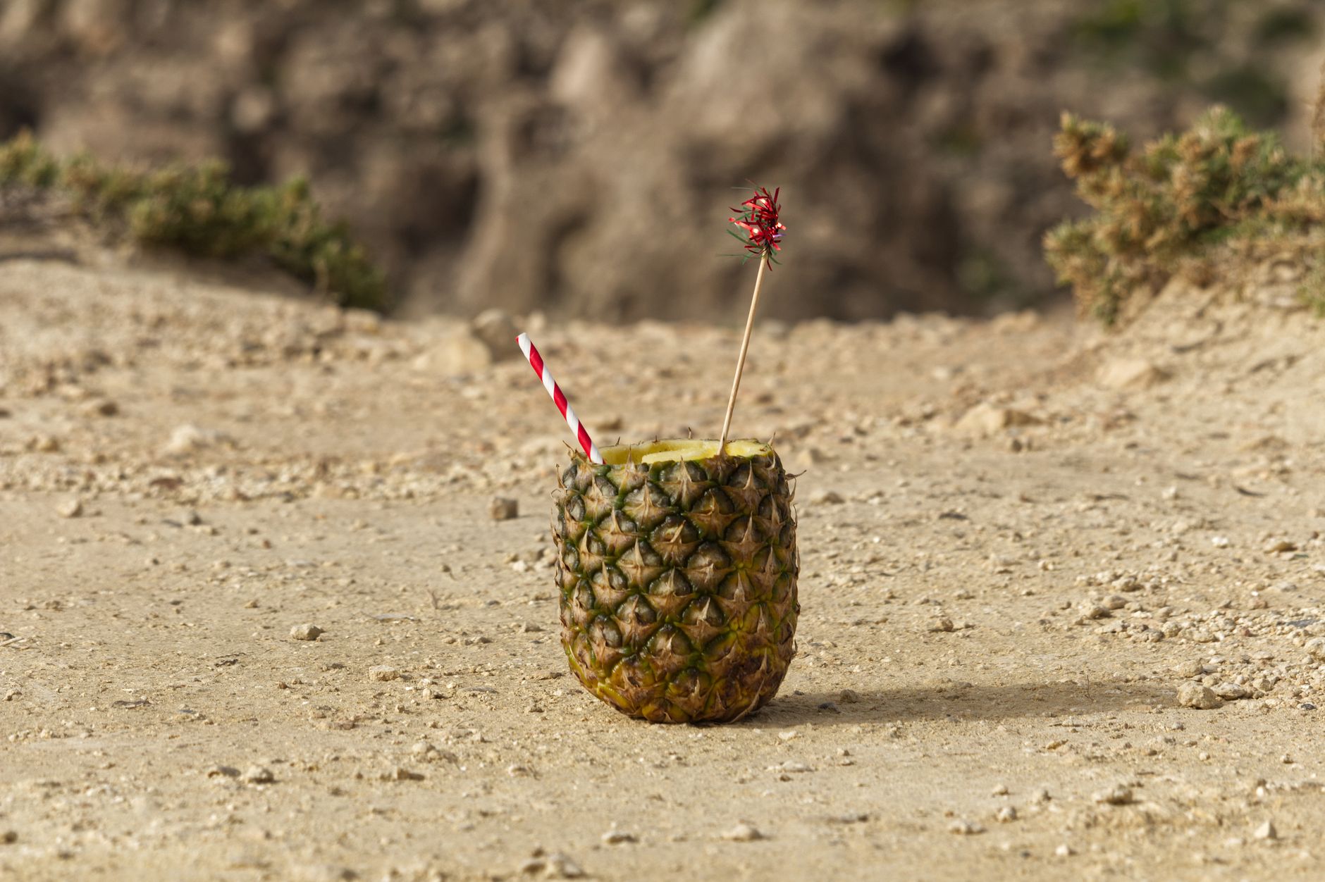 Refreshing pineapple lemonade served in glasses with mint leaves