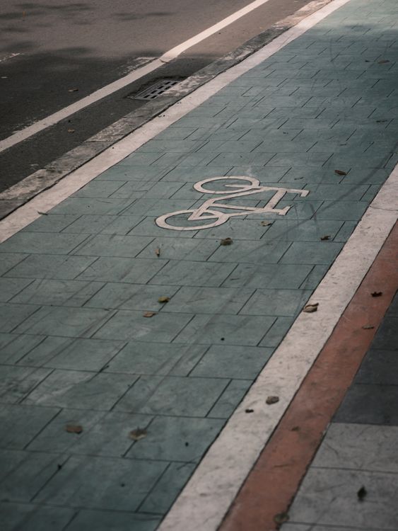 Urban Bicycle Lane with Symbol on Asphalt · Free Stock Photo