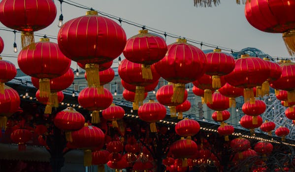 Vibrant red Chinese lanterns hanging at a Moscow festival, creating a festive atmosphere.