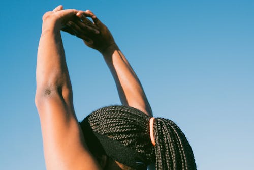 Free Person Raising Her Hands Stock Photo