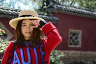 Portrait of Woman in Red Sweater Outdoors