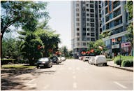 Urban Street in Ho Chi Minh City with Flags