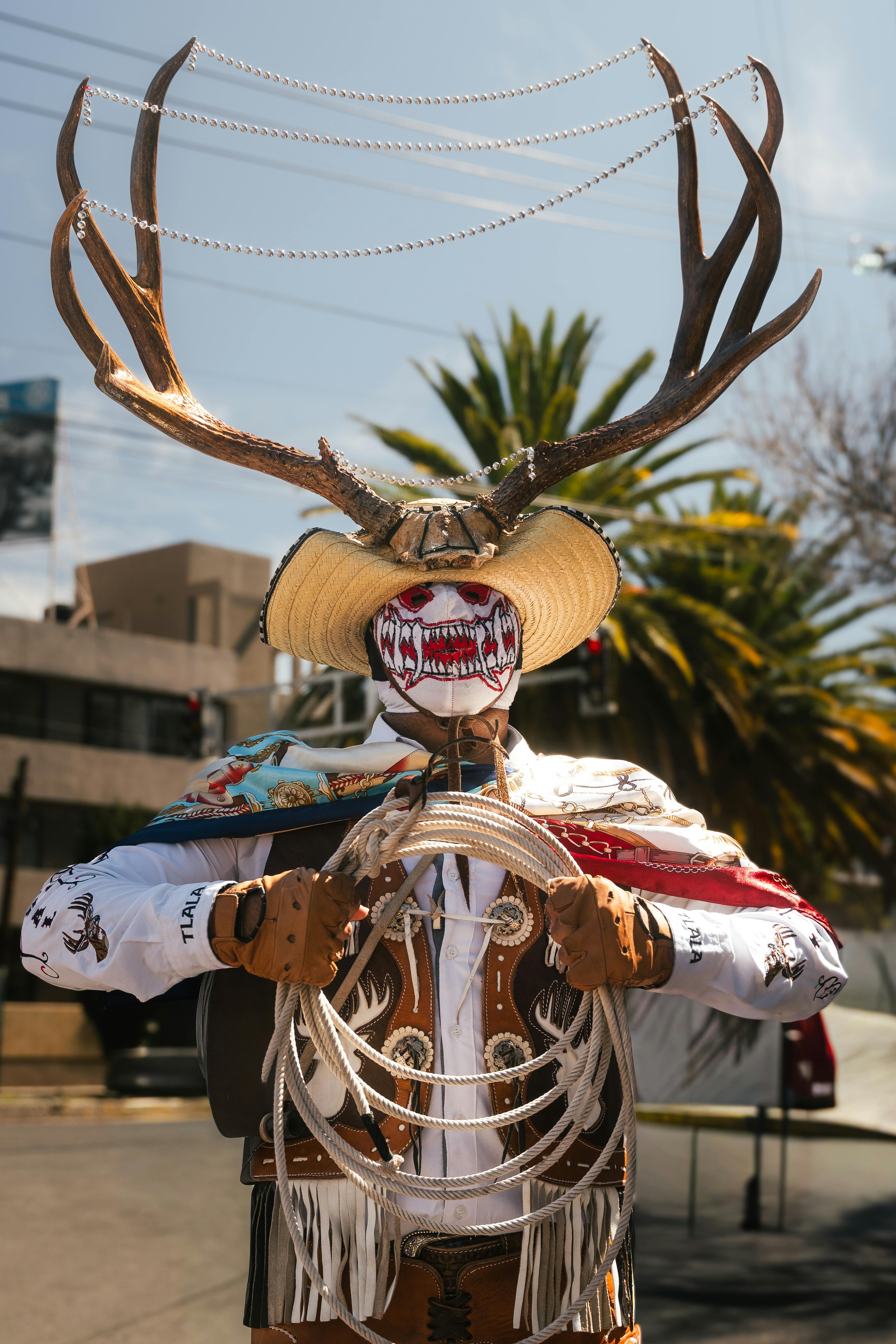 Vibrant traditional Mexican costume with large antlers, perfect for festivals in Pachuca.