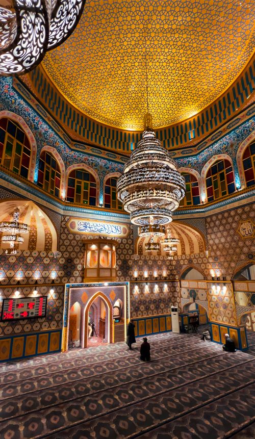 Free Exquisite interior of a mosque in Srinagar, featuring intricate designs and grand chandeliers. Stock Photo