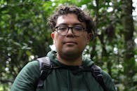 Hiker in Lush Green Jungle Environment