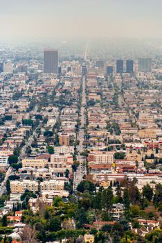 Explore the expansive cityscape and iconic skyline of Los Angeles in this stunning aerial photograph.