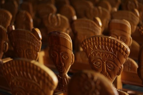 Free Detailed shot of traditional carved wooden heads showcasing artistic craftsmanship. Stock Photo