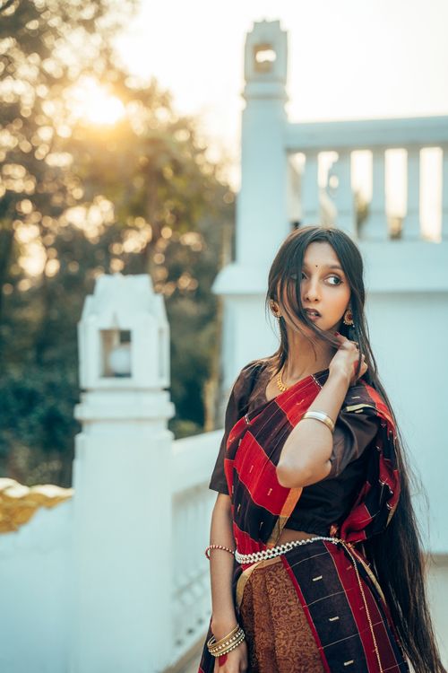 Elegant Portrait of a Young Woman in Traditional Saree · Free Stock Photo