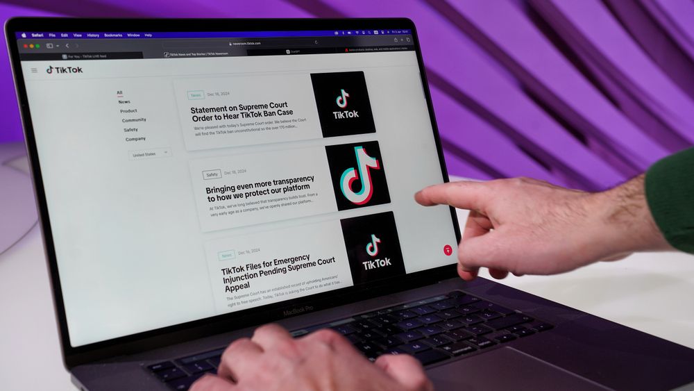 Website displayed on a laptop