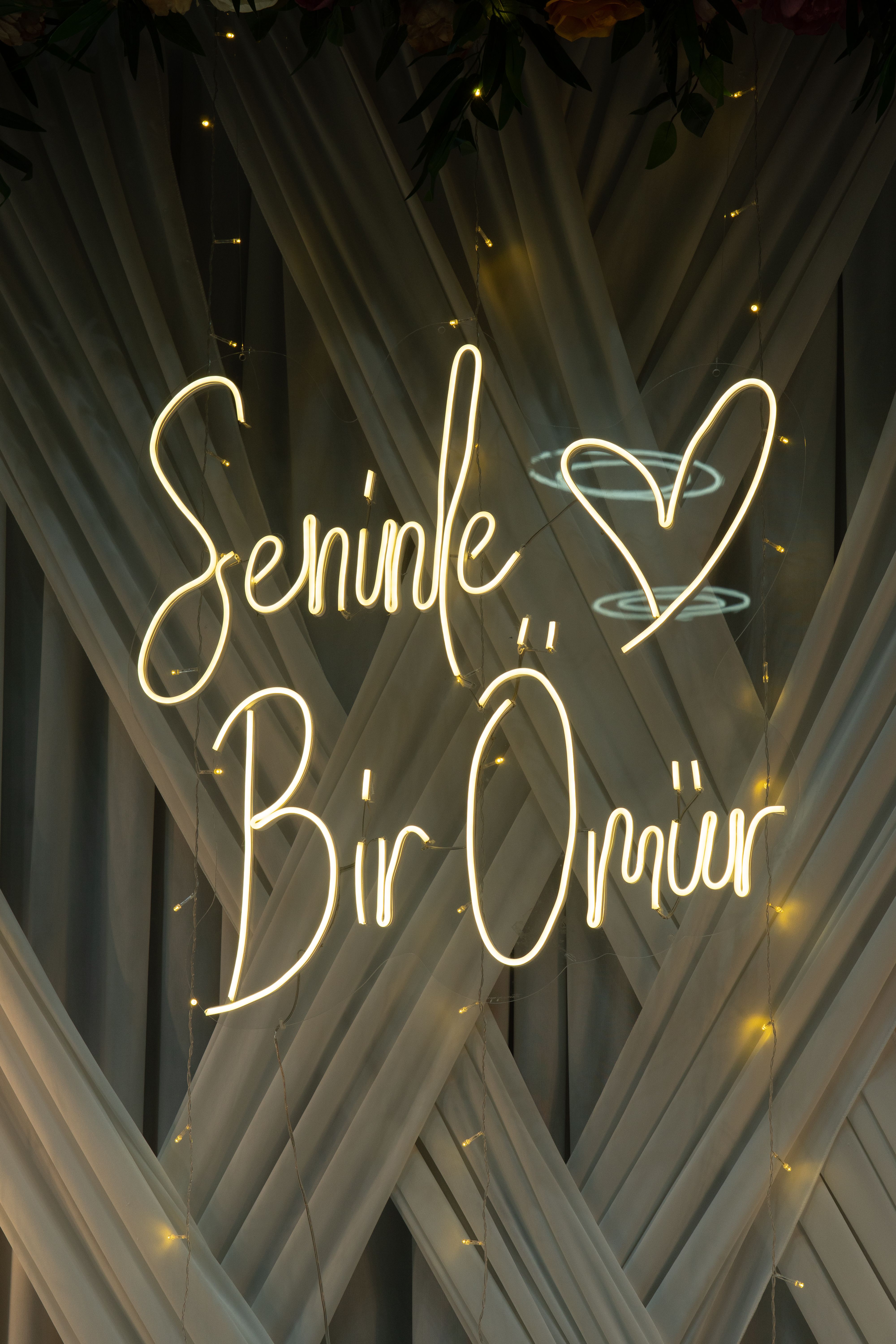 Neon sign with heart motif at a wedding