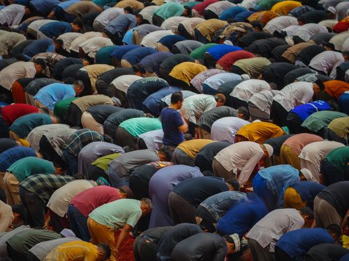 Free Large group of worshippers praying during Taraweeh at a mosque in Jakarta, Indonesia. Stock Photo